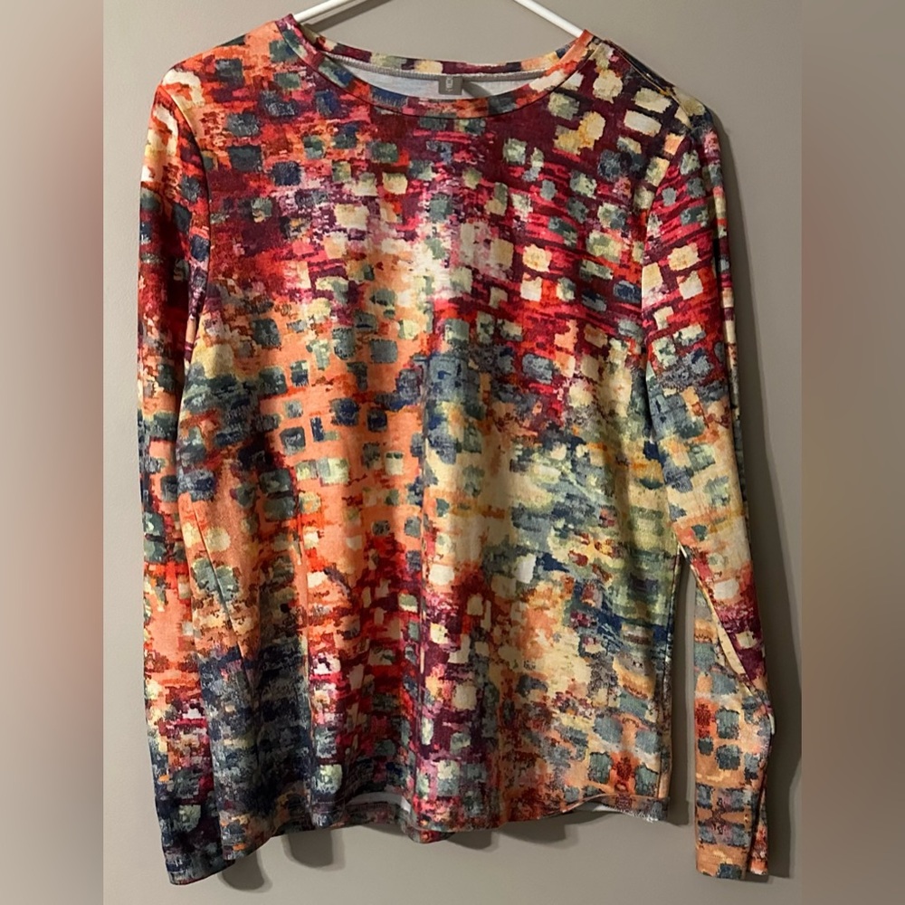 NORACORA size SMALL multi-colored, long sleeved, crew neck top.
